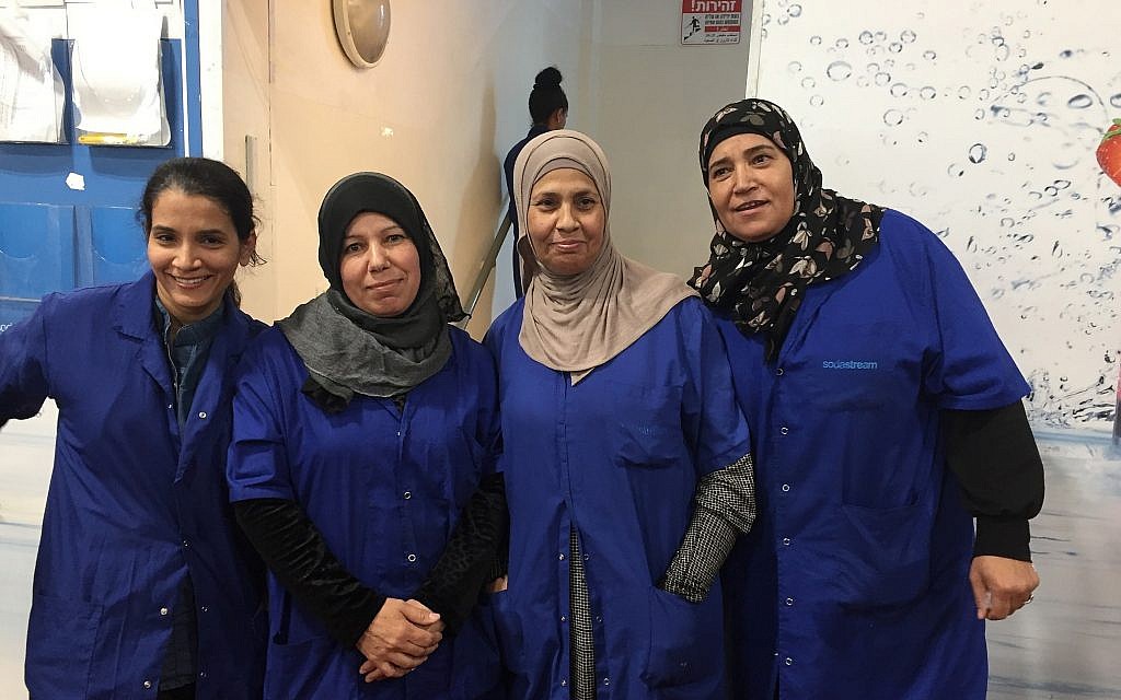 Sharona Apterkar, left to right, Rahma-Al-Turi, Amna-Abu-Adayan and another worker at the Idan HaNegev site of SodaStream; Nov. 15, 2018; (Federico Maccioni/TimesofIsrael)