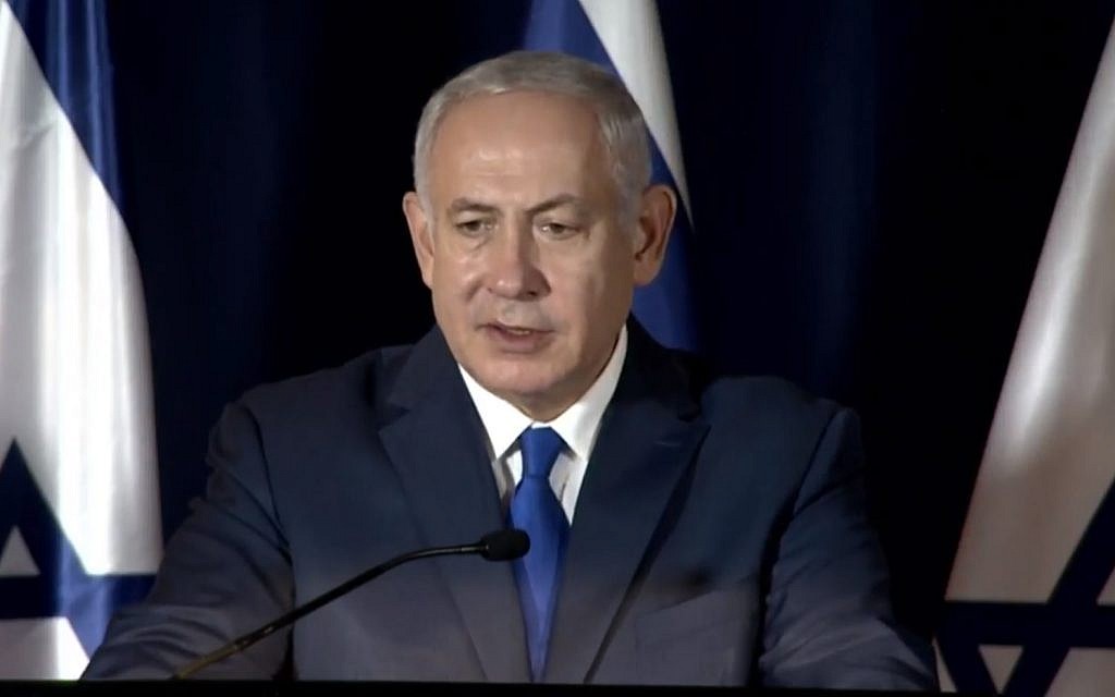 Prime Minister Benjamin Netanyahu speaking at a press conference in Paris, France, on November 11, 2018. (screen capture: GPO)