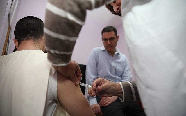 Illustrative: A patient getting a measles vaccination in Jerusalem in November 2018. (Courtesy Health Ministry)