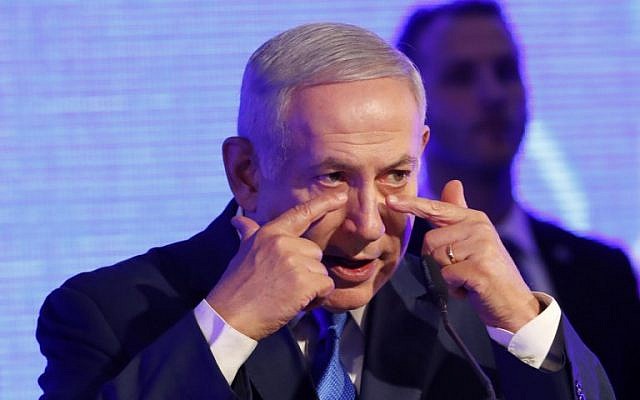 Prime Minister Benjamin Netanyahu delivers a speech before lighting a menorah during the start of Hanukkah in Ramat Gan on December 2, 2018. (Jack GUEZ / AFP)