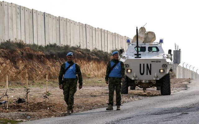 United Nations Interim Force in Lebanon (UNIFIL) soldiers patrol along the border wall with Israel near the southern Lebanese village of Kfar Kila on December 4, 2018. (Mahmoud Zayyat/AFP)