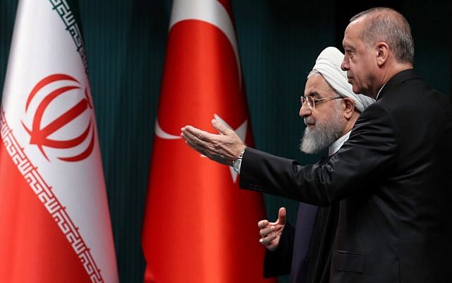 Iran's President Hassan Rouhani, left, and Turkey's President Recep Tayyip Erdogan attend a joint press conference at the Turkish presidential complex in Ankara on December 20, 2018. (Adem Altan/AFP)