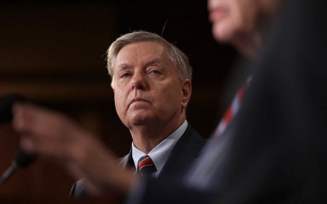 Senator Lindsey Graham (R-SC) listens during a press conference at the US Capitol in Washington, DC, on US President Donald Trump's decision to remove US military forces from Syria. December 19, 2018. (WIN MCNAMEE / GETTY IMAGES NORTH AMERICA / AFP)
