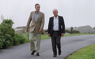 President George H.W. Bush, left, and Prime Minister Yitzhak Rabin of Israel chat as they walk, on Monday, August 10, 1992 on the grounds of Bush’s vacation home in Kennebunkport, Maine. (AP Photo/Greg Gibson)