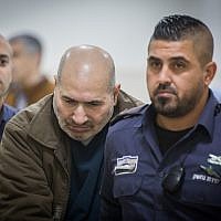 Jamil Tamimi, the Palestinian man who murdered British student Hannah Bladon on April 14, 2017 in Jerusalem, is brought for a court hearing at the Jerusalem District Court, on December 31, 2018. (Yonatan Sindel/Flash90)