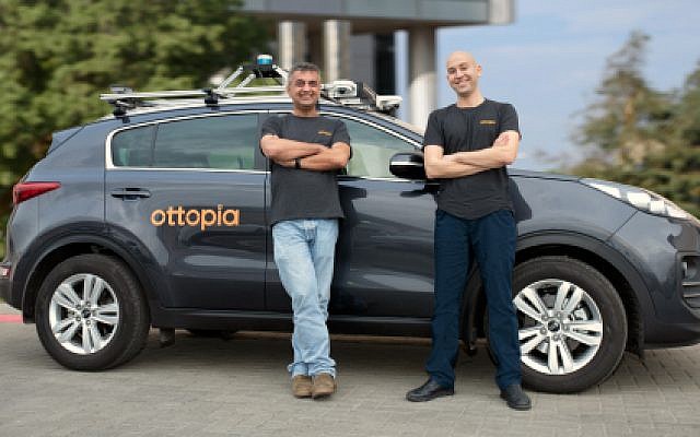 Ottopia’s co-founders, Leon Altarac (CTO) and Amit Rosenzweig (CEO) with the company’s R&D car. (AP/Business Wire)