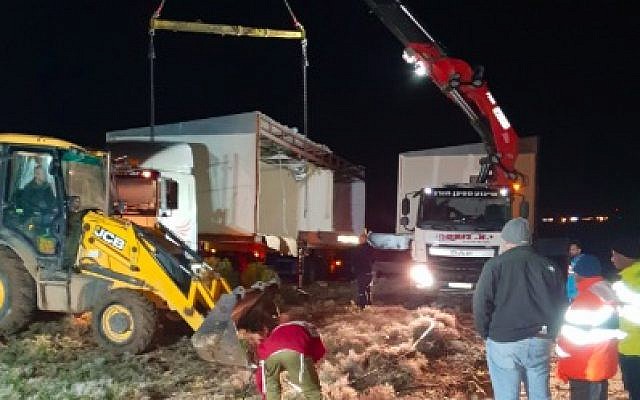 Settlers install a pair of caravans on the hilltop where the illegal Amona outpost once stood on December 13, 2018. (Bezalel Smotrich/Twitter)