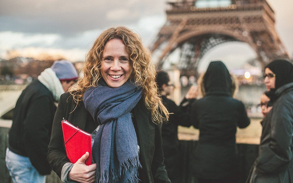 Sharon Heinrich in Paris, across from the Eiffel Tower. (Eyal Yassky-Weiss)