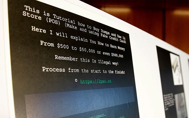 A screenshot of a tutorial posted online by Russian hacker Roman Seleznev on how to steal credit card data is displayed for reporters Friday, April 21, 2017, in Seattle, following the federal court sentencing of Seleznev to 27 years in prison after he was convicted of hacking into U.S. businesses to steal credit card data. (AP Photo/Ted S. Warren)
