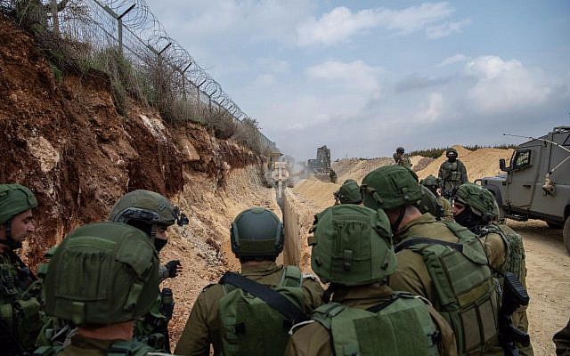 IDF Chief of Staff Gadi Eisenkot, center, visits soldiers searching for Hezbollah attack tunnels on Israeli-Lebanese border on December 4, 2018. (Israel Defense Forces)