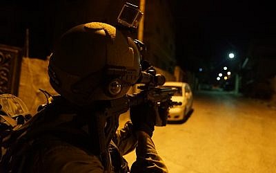 In this undated photograph, Israeli troops search for the terrorist who committed a brutal shooting attack in the Barkan industrial park in the northern West Bank in which two Israelis were killed on October 7, 2018. (Israel Defense Forces)