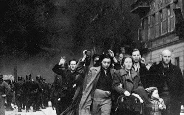 An iconic image from the 1943 Warsaw Ghetto Revolt, during which Jewish resisters temporarily staved the Nazis’ plans to deport the population to death camps (public domain)