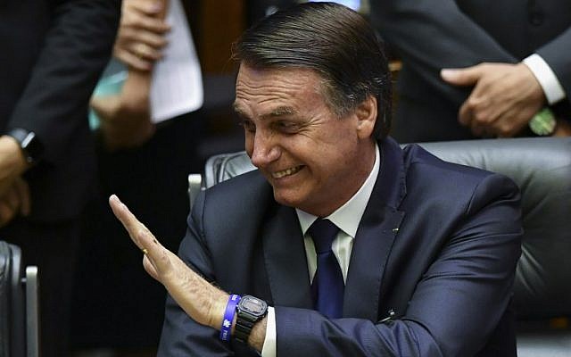 Newly sworn-in Brazilian President Jair Bolsonaro gestures during his inauguration ceremony at the National Congress in Brasilia on January 1, 2019. (Nelson Almeida/AFP)