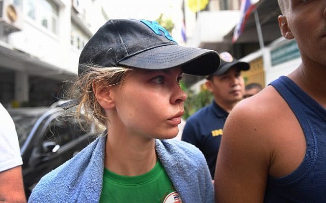 Belarusian model Anastasia Vashukevich known by her pen name Nastya Rybka leaves Thai immigration department in Bangkok on January 17, 2019 during her deportation together with other associates after pleading guilty in court to multiple charges including solicitation and illegal assembly (Lillian Suwanrumpha/AFP)
