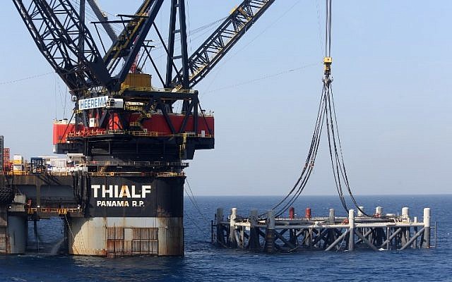 This picture taken on January 31, 2019 shows a view of the SSCV Thialf crane vessel laying the newly-arrived foundation platform for the Leviathan natural gas field in the Mediterranean Sea, about 130 kilometers (81 miles) west of the coast of the Israeli city of Haifa. (Marc Israel Sellem/Pool/AFP)