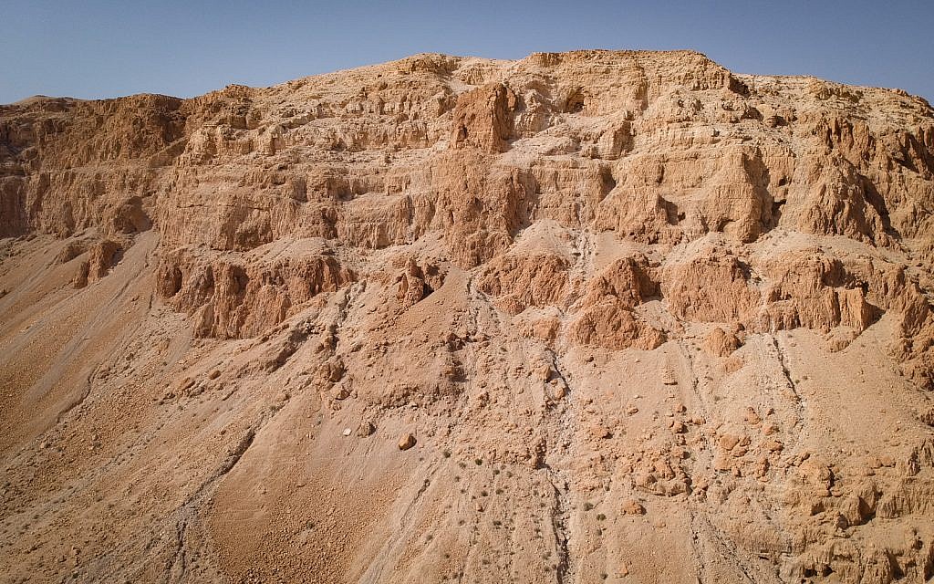 The cliffs at Qumran where many of the Dead Sea scrolls were found, January 22, 2019. (Luke Tress/Times of Israel)