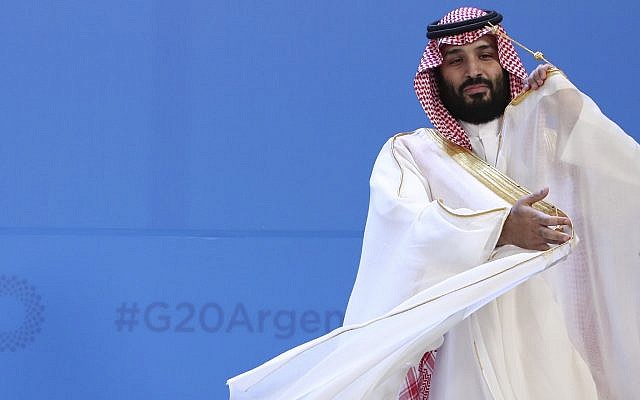 In this photo from November 30, 2018, Saudi Arabia's Crown Prince Mohammed bin Salman adjusts his robe as leaders gather for the group at the G20 Leader's Summit at the Costa Salguero Center in Buenos Aires, Argentina. (AP Photo/Ricardo Mazalan, File)