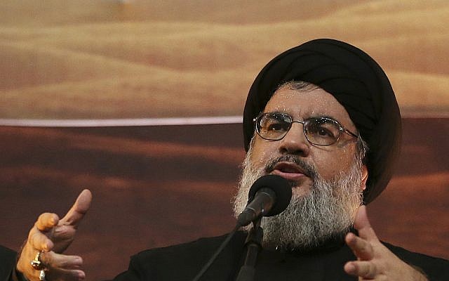 Hezbollah leader Hassan Nasrallah addresses supporters in a southern suburb of Beirut, Lebanon, November 3, 2014. (AP Photo/Hussein Malla, File)