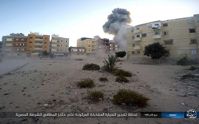 This photo posted on a file sharing website on Jan. 11, 2017, by the Islamic State Group in Sinai shows an explosion during an attack on an Egyptian police checkpoint on Monday, Jan. 9, 2017, in el-Arish, north Sinai, Egypt. (Islamic State Group in Sinai/AP)