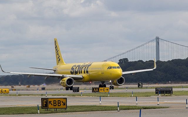 In this August 8, 2017 photo, a Spirit Airlines airplane is seen on the tarmac at LaGuardia Airport in the Queens borough of New York. (AP Photo/Mary Altaffer)