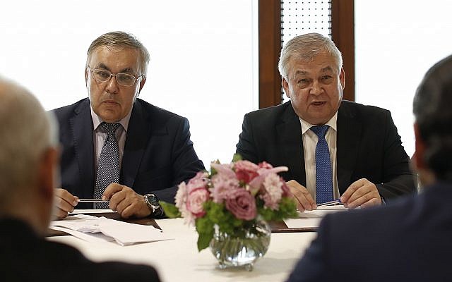 Russia's special presidential envoy to Syria Alexander Lavrentiev, right, and Russian Deputy Foreign Minister Sergei Vershinin, center, in Beirut, Lebanon, July 26, 2018 (AP Photo/Hassan Ammar/File)