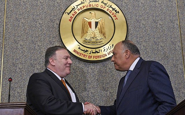US Secretary of State Mike Pompeo, left, shakes hands with Egyptian Foreign Minister Sameh Shoukry after holding a press conference, at the ministry of foreign affairs in Cairo, January 10, 2019. (Andrew Caballero-Reynolds/Pool Photo via AP)