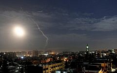 Illustrative. This photo released by the Syrian official news agency SANA, shows missiles flying into the sky near the international airport in Damascus, Syria, January 21, 2019. (SANA via AP)