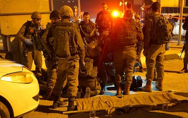 Soldiers at the scene of an attempted stabbing attack near the West Bank city of Nablus on January 21, 2019. (Israel Defense Forces)