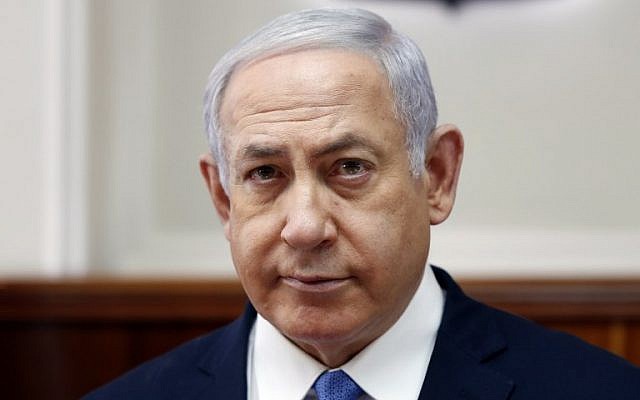 Prime Minister Benjamin Netanyahu attends a weekly cabinet meeting at his office in Jerusalem on February 3, 2019. (Ronen Zvulun/Pool/AFP)