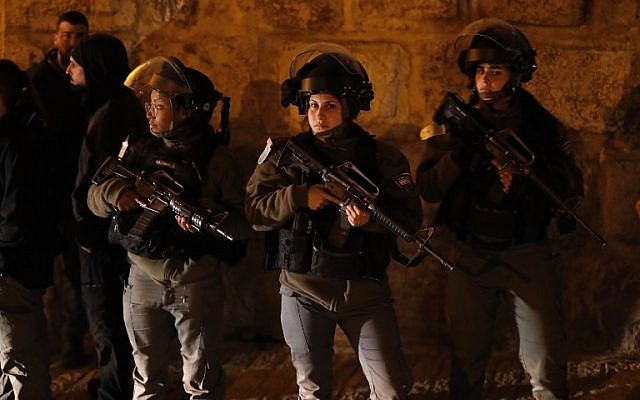 Border Police patrol near an entrance to the Temple Mount compound in Jerusalem's Old City, on February 19, 2019. (Ahmad Gharabli/AFP)