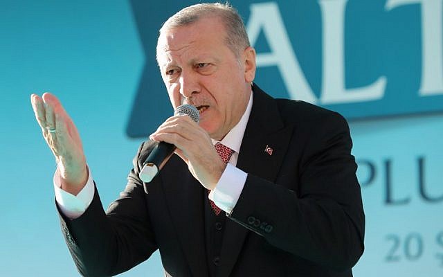 Turkish President and the leader of Turkey's ruling Justice and Development Party (AKP) Recep Tayyip Erdogan delivers a speech during his party's campaign rally in Altindag district of Ankara, Turkey on February 20, 2019. (Photo by Adem ALTAN / AFP)