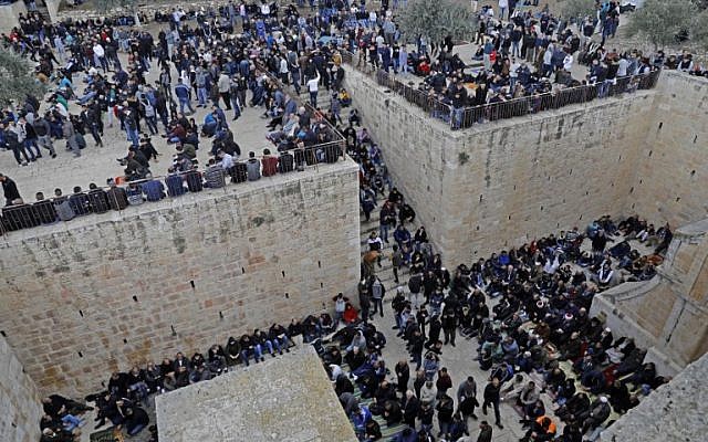 Palestinians worshipers gather before Friday noon prayers at the premises of the Golden Gate on the Temple Mount in the Old City of Jerusalem, on February 22, 2019. (Ahmad Gharabli/AFP)