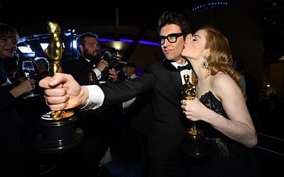Best Live Action Short Film winners for 'Skin' director Guy Nattiv, left,  and Jaime Ray Newman attend the 91st Annual Academy Awards Governors Ball at the Hollywood and Highland Center in Hollywood, California on February 24, 2019. (Robyn BECK/AFP)