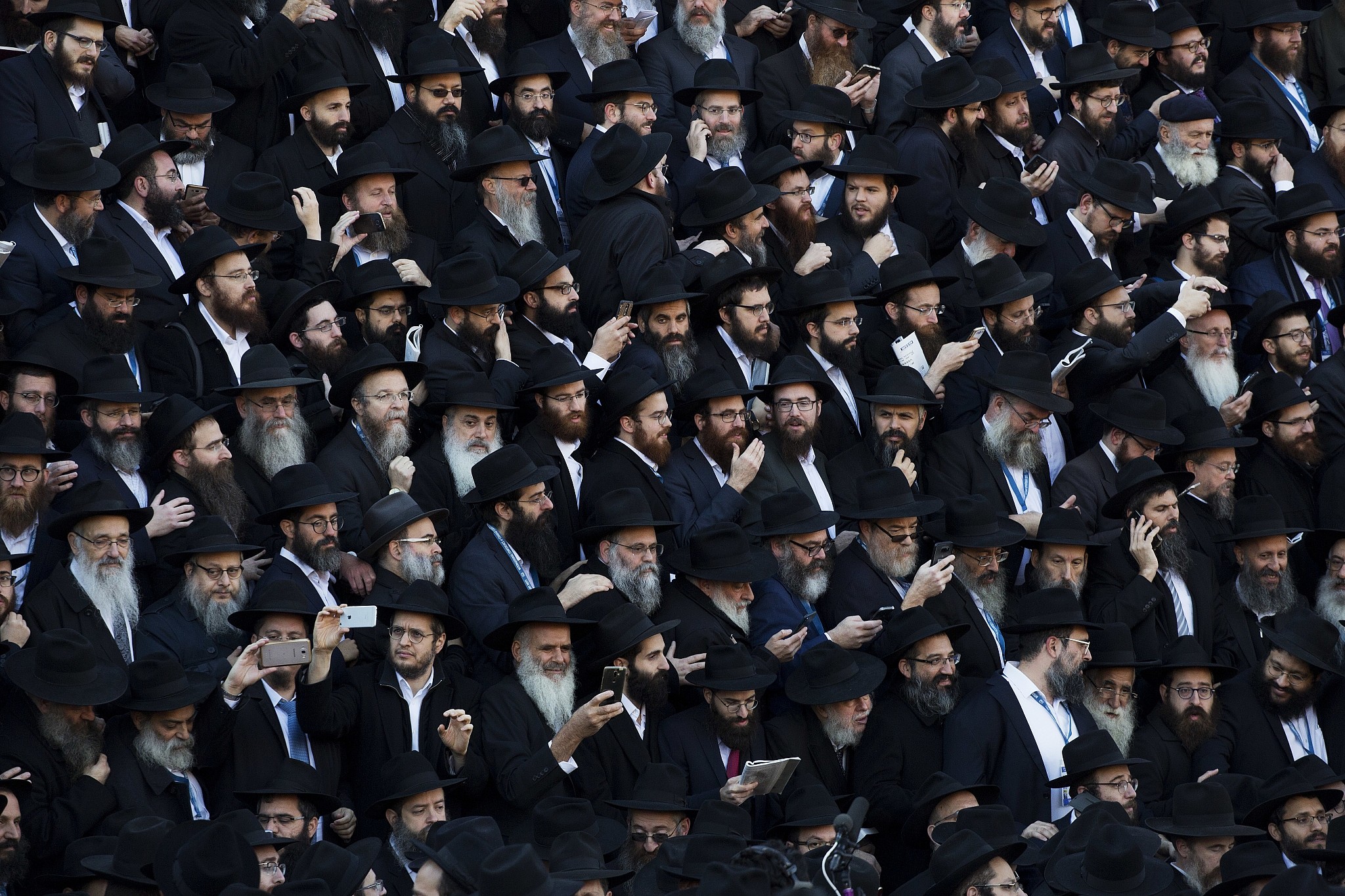 Illustrative: Crowds of rabbis gather for a group photo at the Chabad-Lubavitch World Headquarters, November 4, 2018, in New York.(AP Photo/Mark Lennihan)