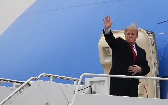 US President Donald Trump boards Air Force One as he leaves Andrews Air Force Base, Maryland, Feb. 11, 2019, for a trip to El Paso, Texas (AP Photo/Manuel Balce Ceneta)