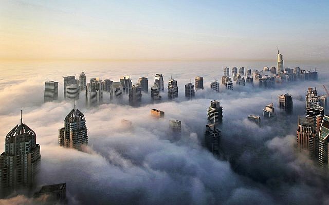 In this Monday, October 5, 2015 photo, a thick blanket of early morning fog partially shrouds the skyscrapers of the Marina and Jumeirah Lake Towers districts of Dubai, United Arab Emirates (AP Photo/Kamran Jebreili)