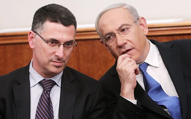 Prime Minister Benjamin Netanyahu, right, and then-interior minister Gideon Sa'ar, left, at the Prime Minister's Office in Jerusalem on December 25, 2012. (Miriam Alster/ Flash90/ File)
