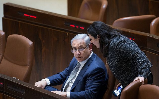 Prime Minister Benjamin Netanyahu (L) speaks with Justice Minister Ayelet Shaked at the Knesset on February 10, 2016. (Yonatan Sindel/Flash90)