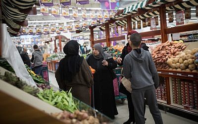 Palestinians shopping at the new Atarot Mall, opened by businessman Rami Levy, owner of the Rami Levy supermarket chain, on January 13, 2019. (Hadas Parush/Flash90)