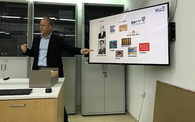 Dr. Haim Gertner giving a presentation in the Yad Vashem archives, December 2018. (Brad Pomerance/TOI)