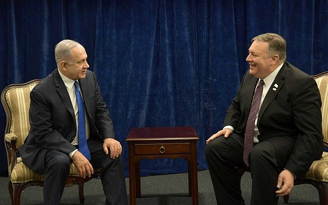 Prime Minister Benjamin Netanyahu (L) and US Secretary of State Mike Pompeo meet at the conference on Peace and Security in the Middle east in Warsaw, on February 14, 2019.  (Amos Ben Gershom/GPO)