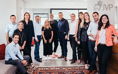 The investment team of Jerusalem Venture Partners (JVP) with founder Erel Margalit at the center in a blue shirt (Courtesy)