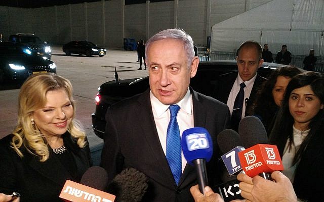 Prime Minister Benjamin Netanyahu speaking with reporters at Ben Gurion Airport before his departure to a conference in Poland, February 11, 2019. (Raphael Ahren/Times of Israel)
