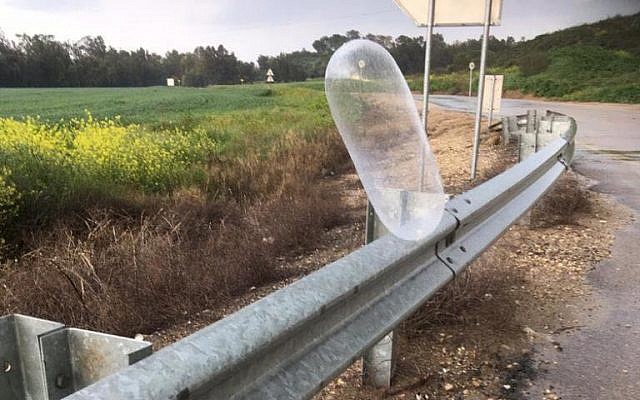 A balloon carrying a suspected explosive device from the Gaza Strip touches down in southern Israel on February 19, 2019. (Yediot MeHaShetah)