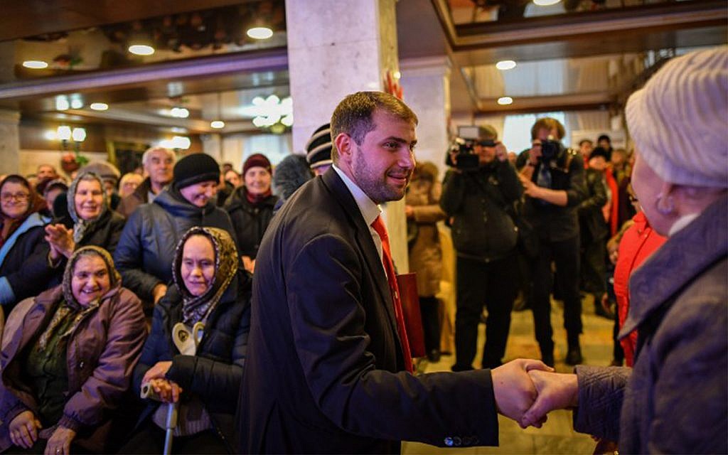 Moldova's parliamentary candidate Ilan Shor, businessman, leader of his self-named party and the mayor of the town of Orhei, meets with supporters during a campaign event in the city of Comrat on February 15, 2019. (Daniel Mihailescu/AFP)