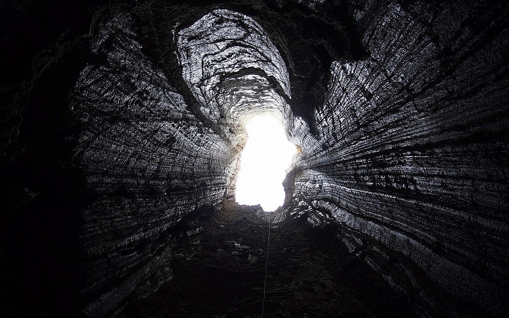 One of the vertical openings that allows cavers to rappel down into the Malcham cave system from the top of Mount Sodom near the southern Dead Sea, pictured on March 22, 2019. (courtesy Anton Chikishev/Hebrew Unviersity)