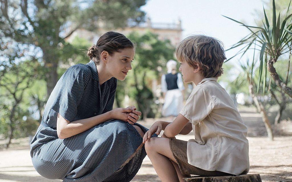 In this still from the new historical dramatic film 'The Light of Hope,' Swiss nurse Elisabeth Eidenbenz speaks with Pat, one of the children at her maternity hospital that she ran for refugees from 1939 to 1944 in Elne, France. (Courtesy)