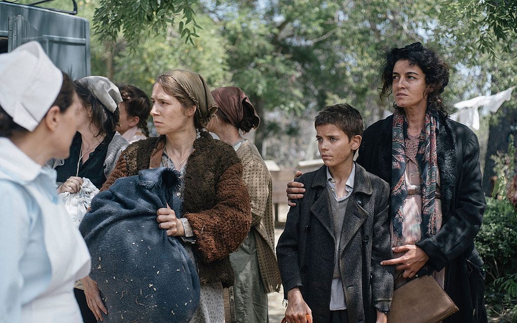 Jewish refugee Maya Cohen, right, and her son David are shown in this still from the new World War II historical dramatic film 'The Light of Hope.' (Courtesy)