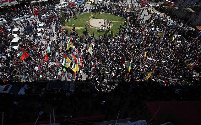 Over a thousand Palestinians participate in a funeral procession in Nablus on March 20, 2019. (Wafa)