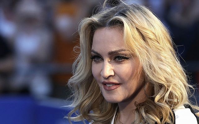 Madonna poses for photographers upon arrival at the world premiere of the film 'The Beatles, Eight Days a Week,' in London, September 15, 2016. (AP Photo/Kirsty Wigglesworth)